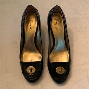 Coach black patent leather heels with gold details, Size 7.5.